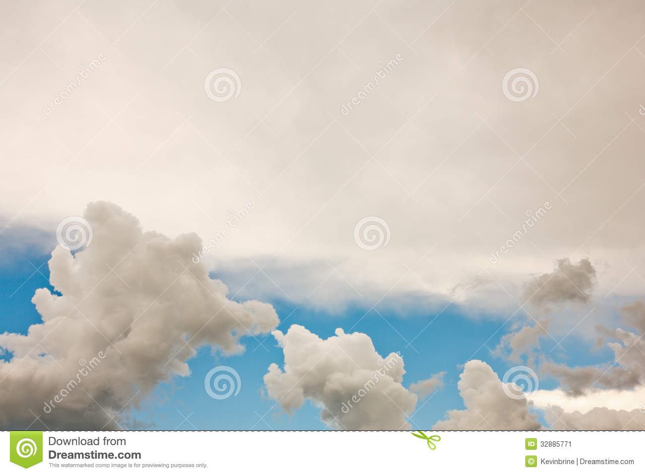 Cumulus Clouds And White Stratus Cloud With A Strip Of Blue Sky