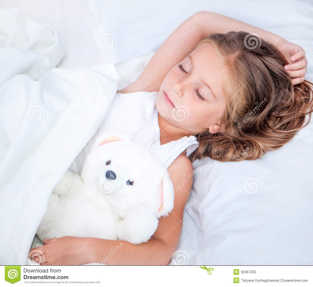 Beautiful Six Year Old Girl Sleeping In The Bed With Her Teddy Bear