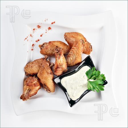 Fried Chicken Wings With Sauce Isolated On White By Clipping Path