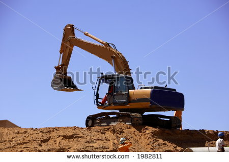 Excavator Digging A Trench