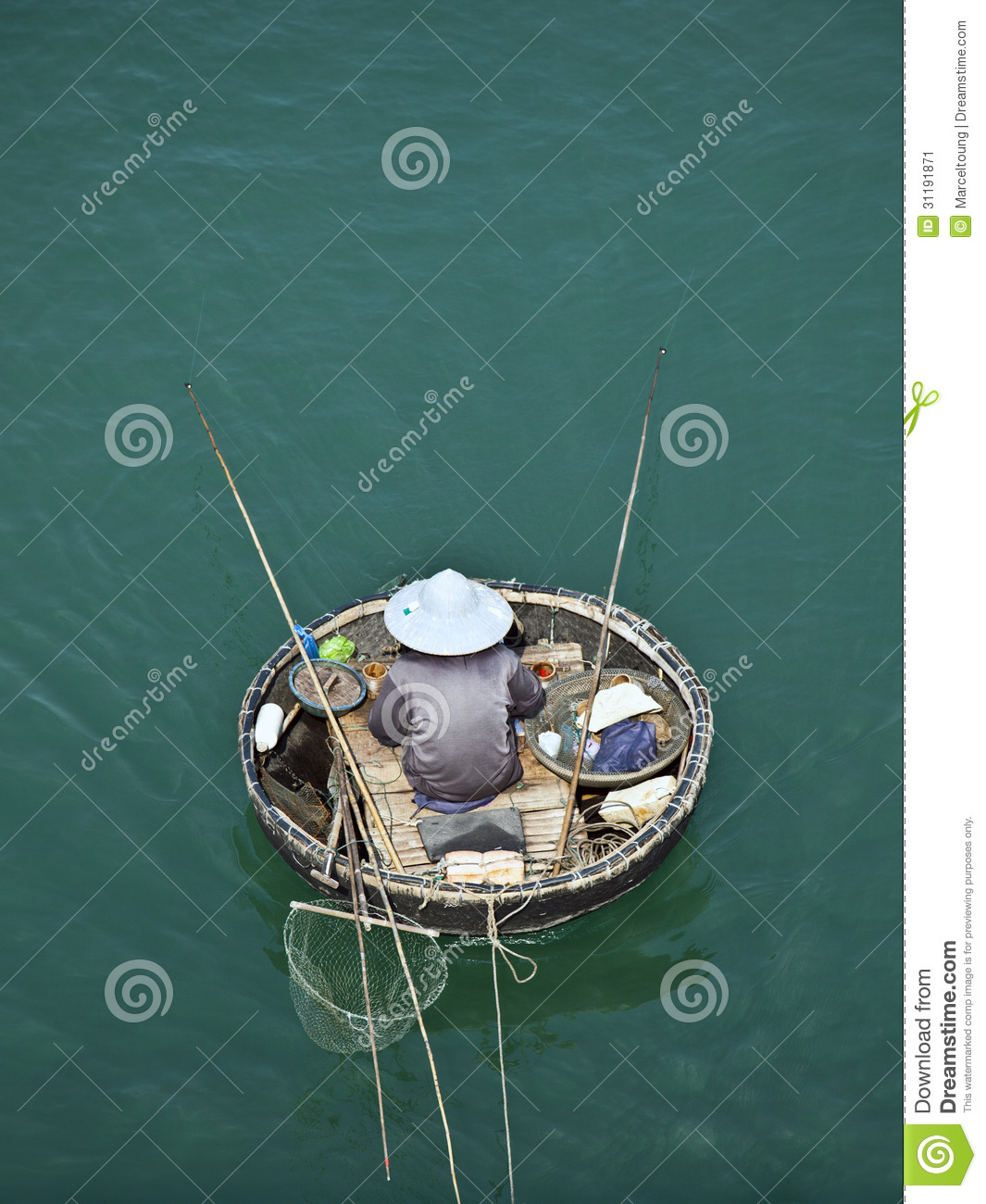 Birds Eye View Of Man In Traditional Round Vietnamese Fishing Boat