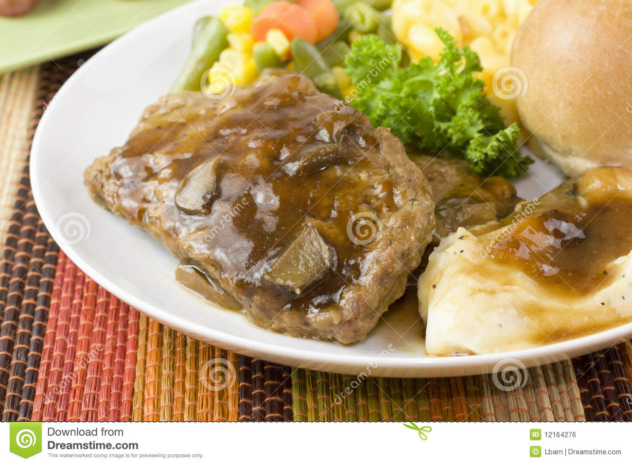 Closeup Of Meatloaf Slices With Mushroom Gravy Mashed Potato And