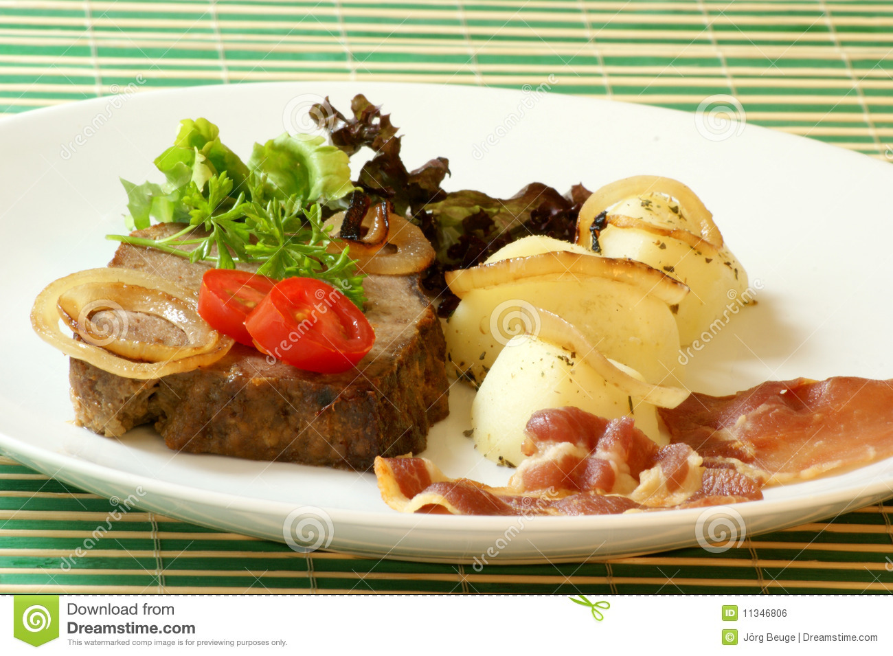 Sliced Meat Loaf With Bacon On A Plate Royalty Free Stock Image