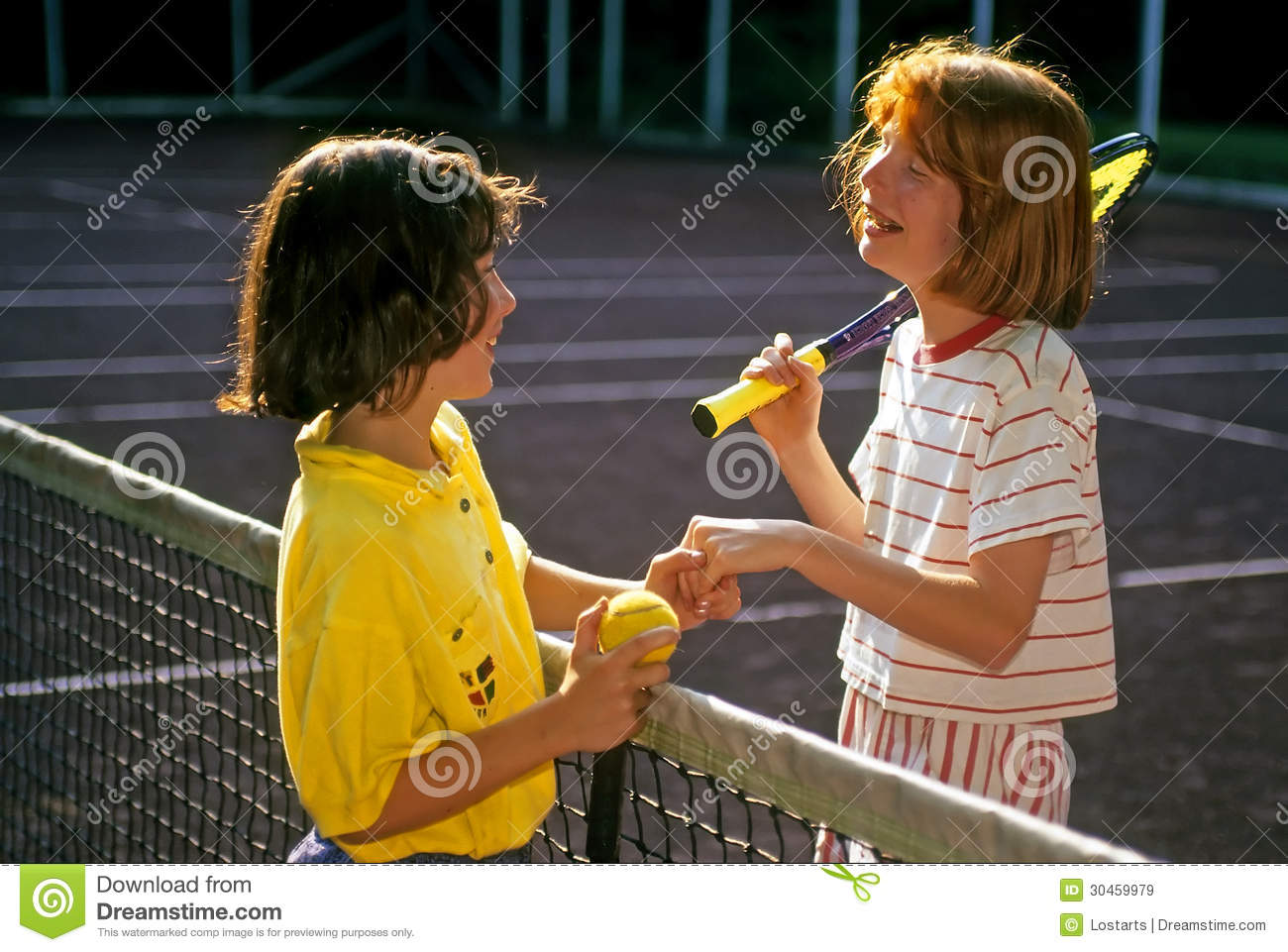 Two Girls At Summer Camp Demonstrate Good Sportsmanship After Their