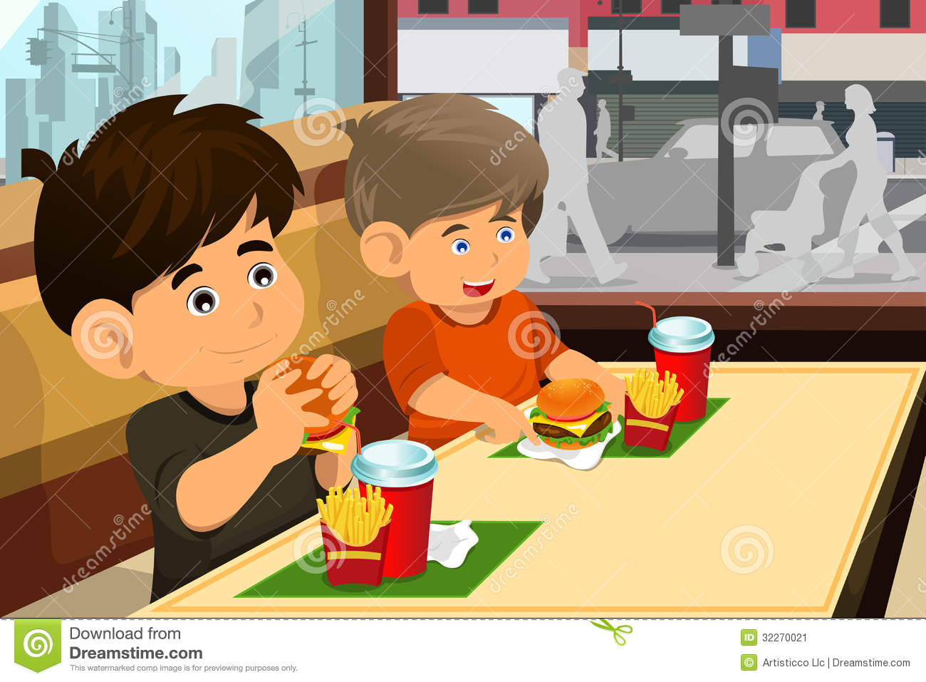 Of Happy Kids Eating A Hamburger And Fries In A Fast Food Restaurant