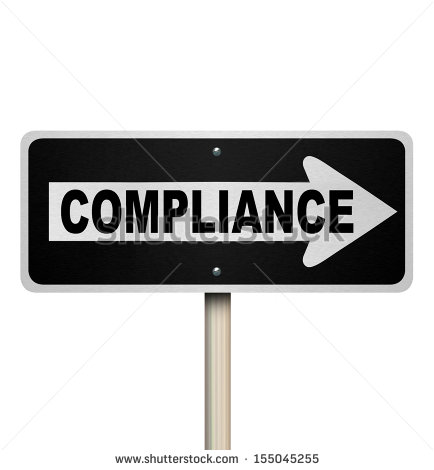 The Word Compliance On A Street Sign Pointing The Way To Complying
