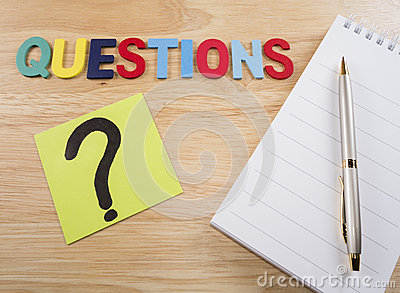 Word Spelling Questions Question Mark Pen And White Notebook On Wood