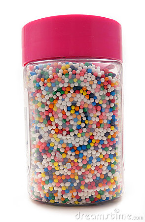 Colorful Sprinkles For Cake Decoration In A Jar With Pink Lid