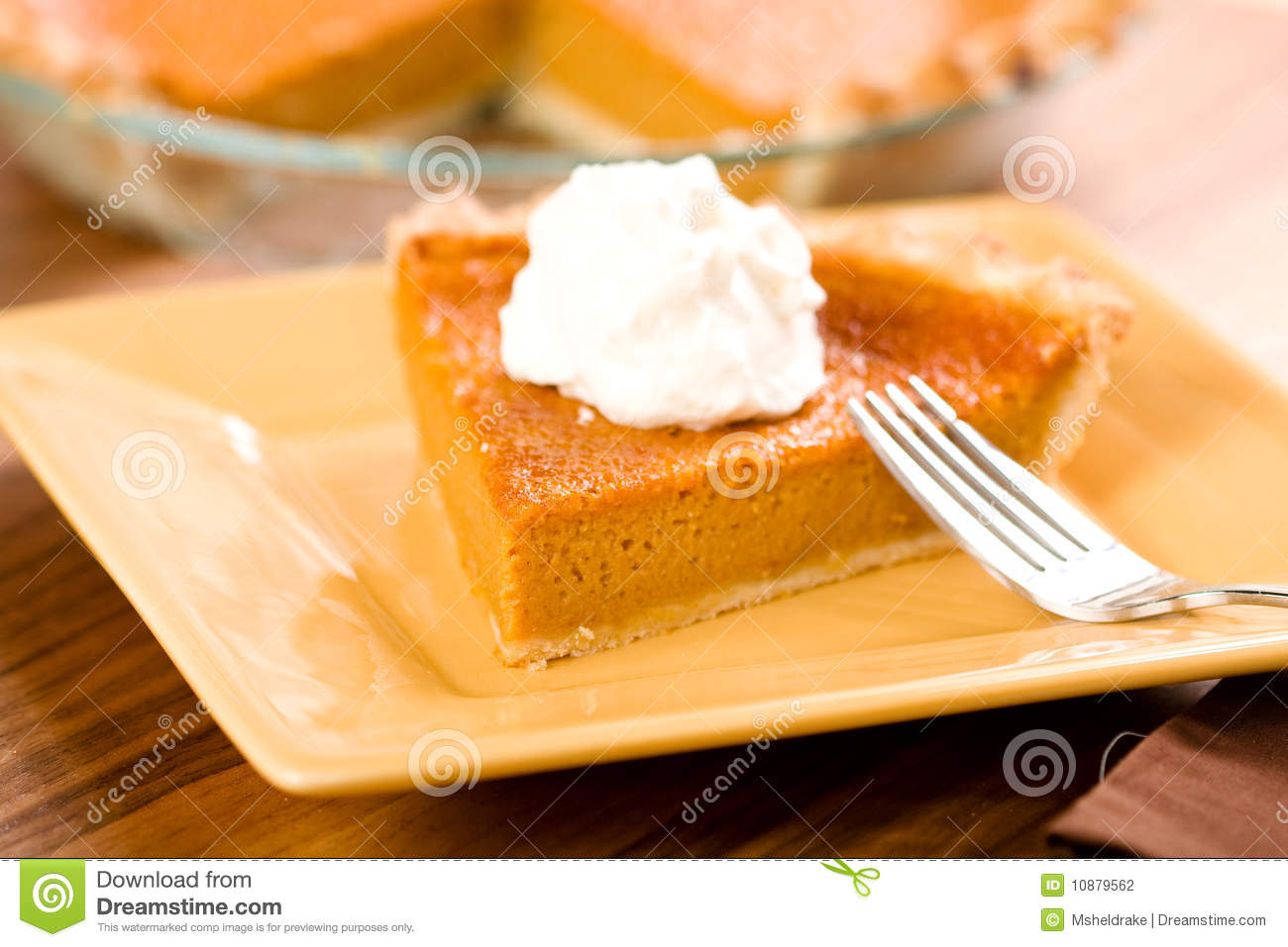 Sweet Potato Pie With A Dollop Of Freshly Whipped Cream