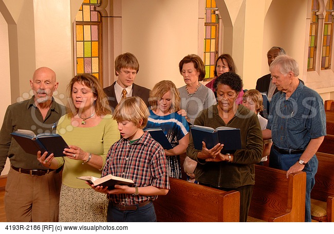 Church Congregation Singing Hymns In Church   Stock Photos   Royalty