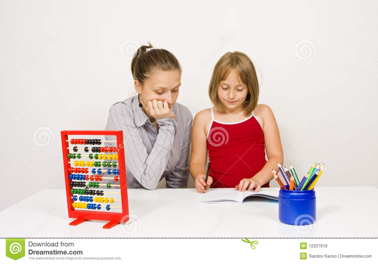 Learning Together With Her Student Or Daughter Paying Attention
