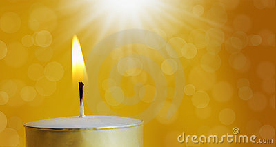 One Burning Candle With Bright White Light Royalty Free Stock Image
