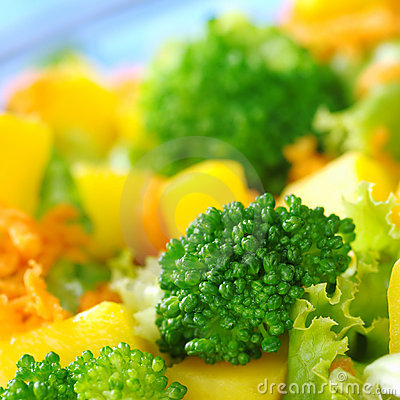 Broccoli On Fresh Salad  Broccoli Mango Carrot Lettuce  In A Bowl